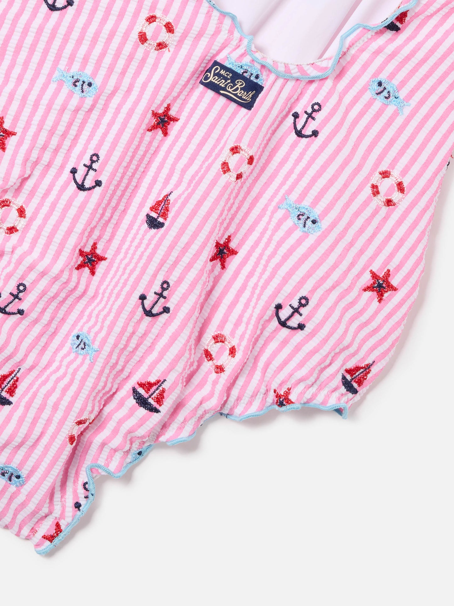 Clio one-piece swimsuit in embroidered seersucker with pink stripes