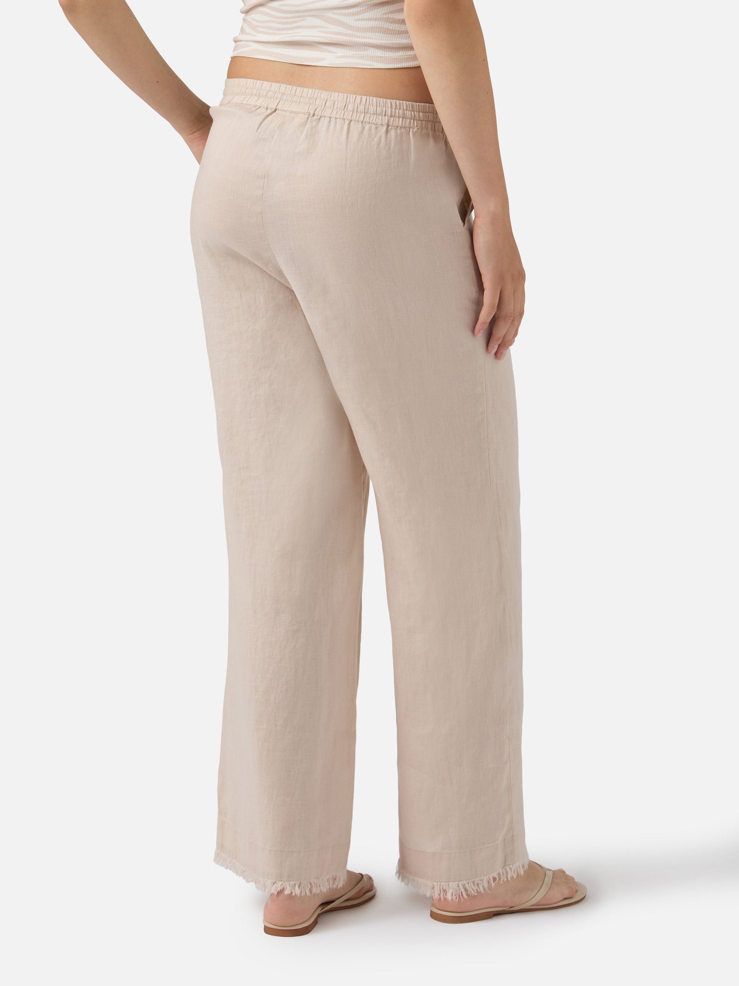 Pantalones Irma de lino beige con bajo deshilachado