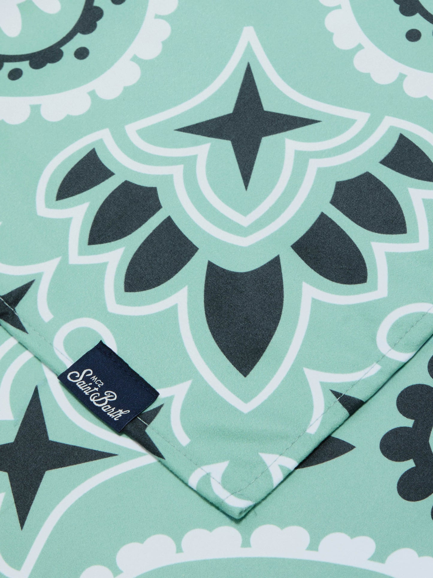 Aidan beach towel with bandana print and logo