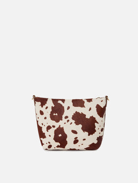 Aline bag in cow print pony hair with metal logo plaque