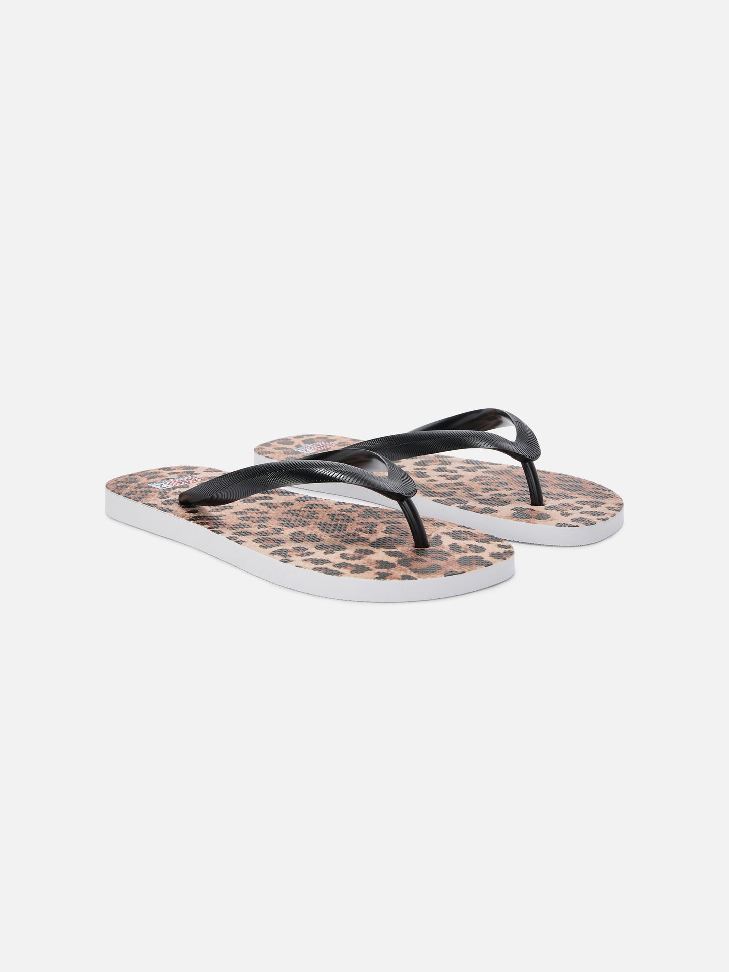 Alma rubber slip-on flip flops with leopard print