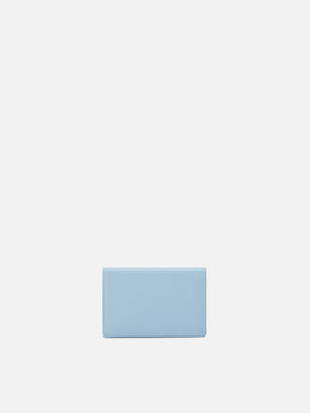Light blue smooth leather card holder with metal logo