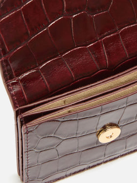 Tarjetero de piel bordeaux con estampado croco 