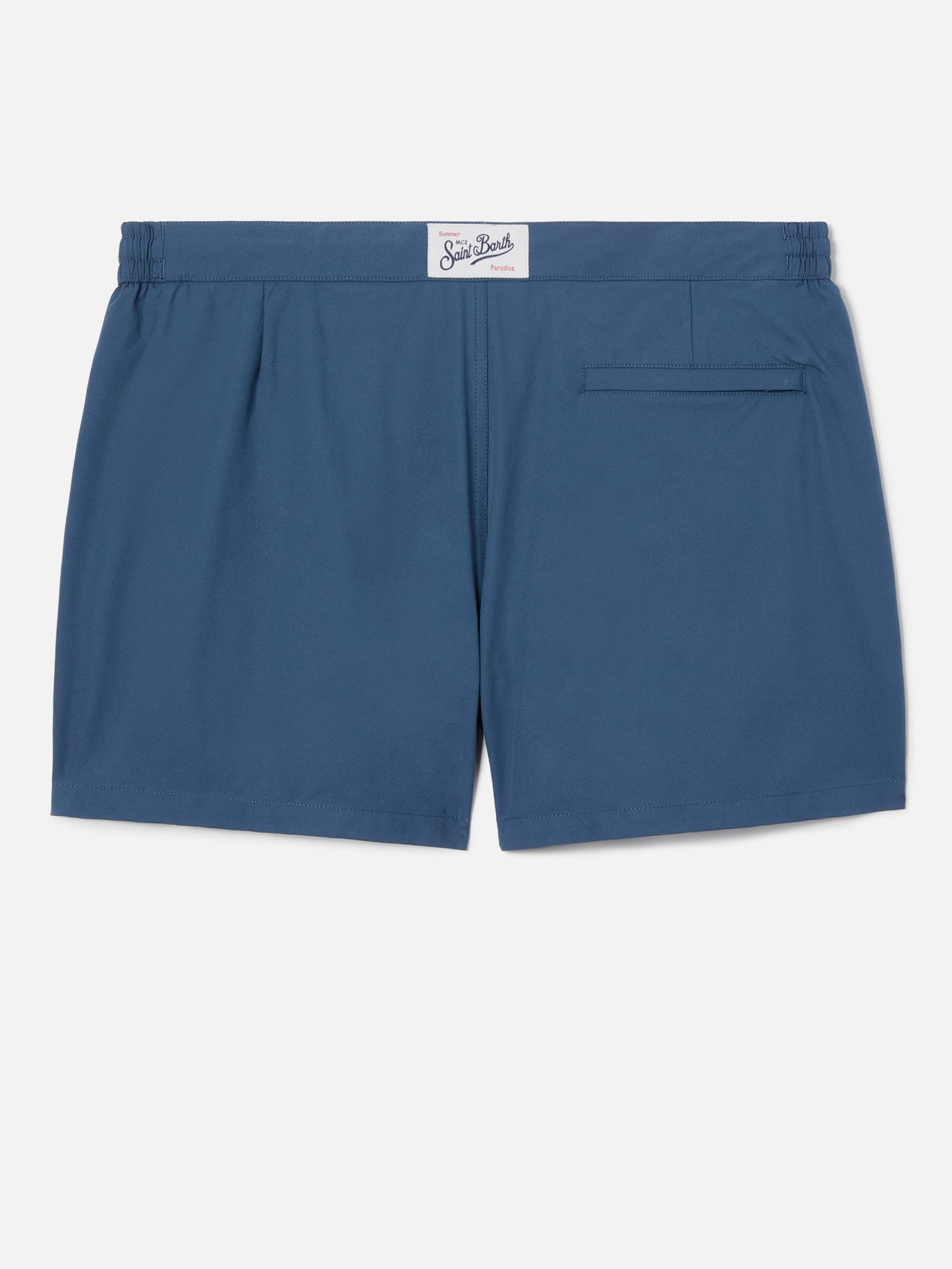 Capferrat swim shorts in solid navy blue with embroidered logo