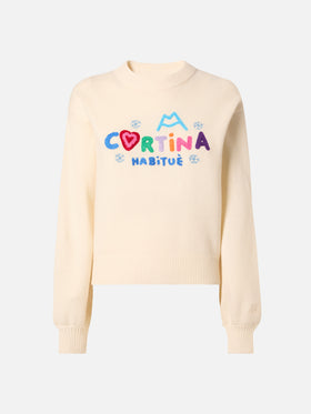 White crewneck Danya with Cortina Habitué patch