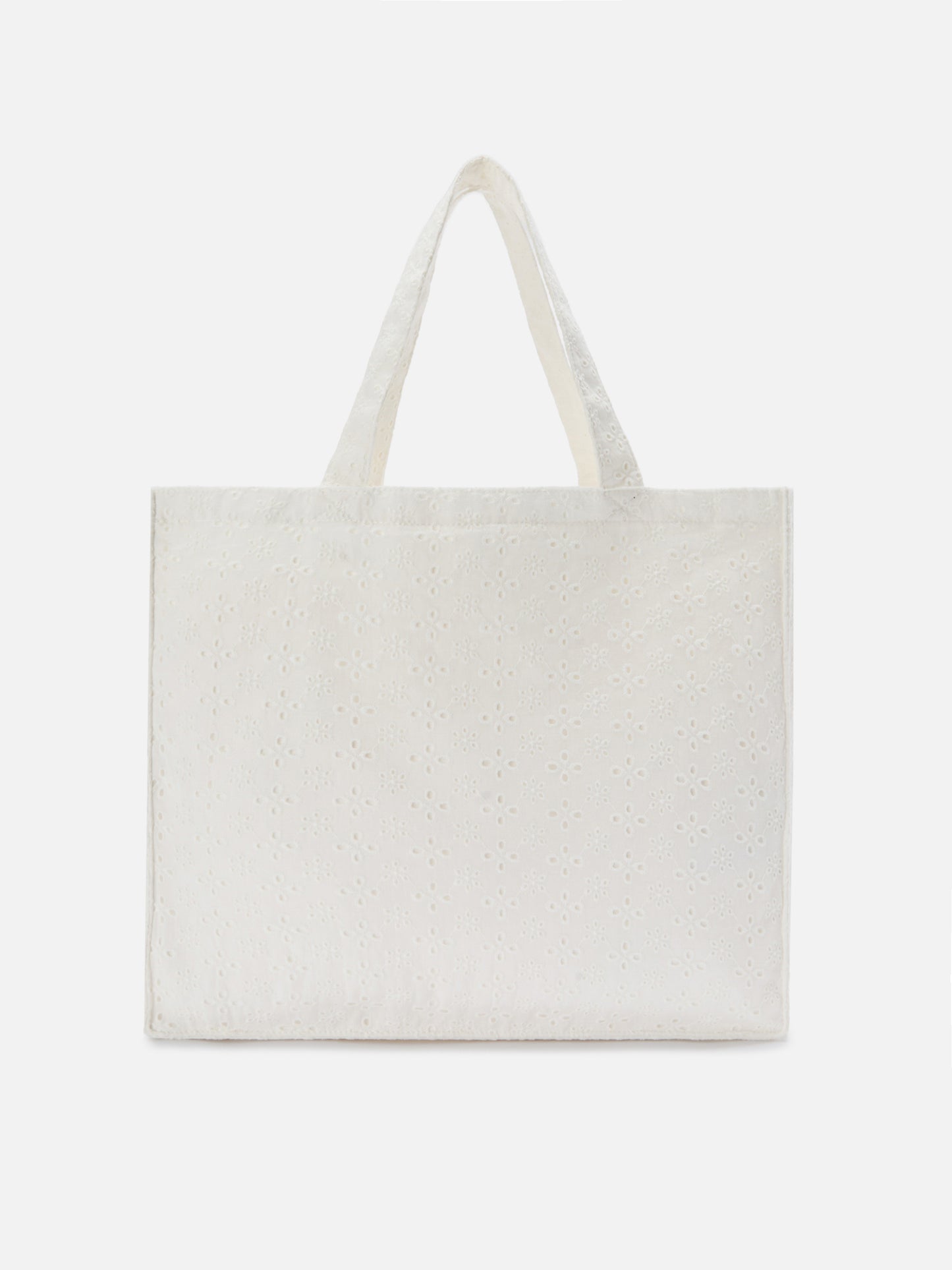 Essential white broderie anglaise cotton tote bag with contrasting logo