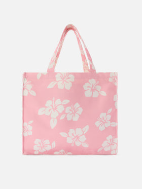 Canvas-Shopper im Essential-Design mit pinkem Hibiskus-Print und kontrastierendem Logo 