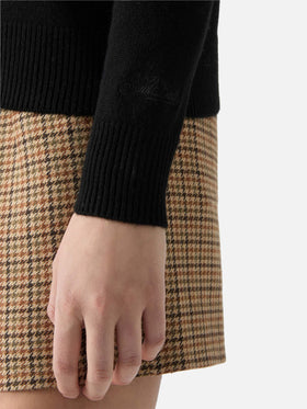 Black Eze wool sweater with polo collar