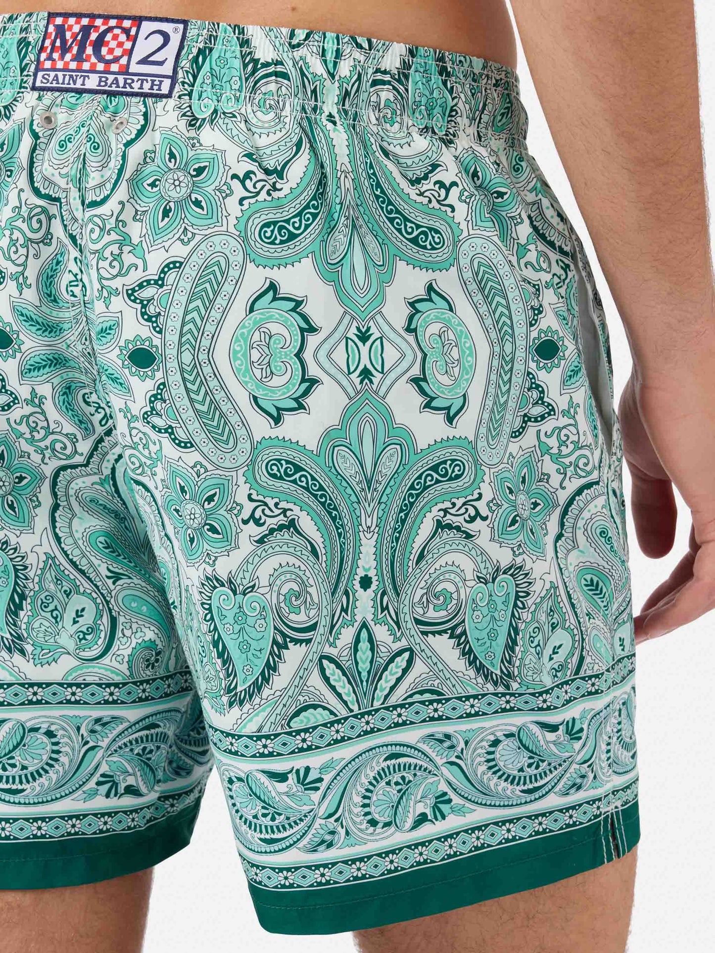 Gustavia swim shorts with green paisley print