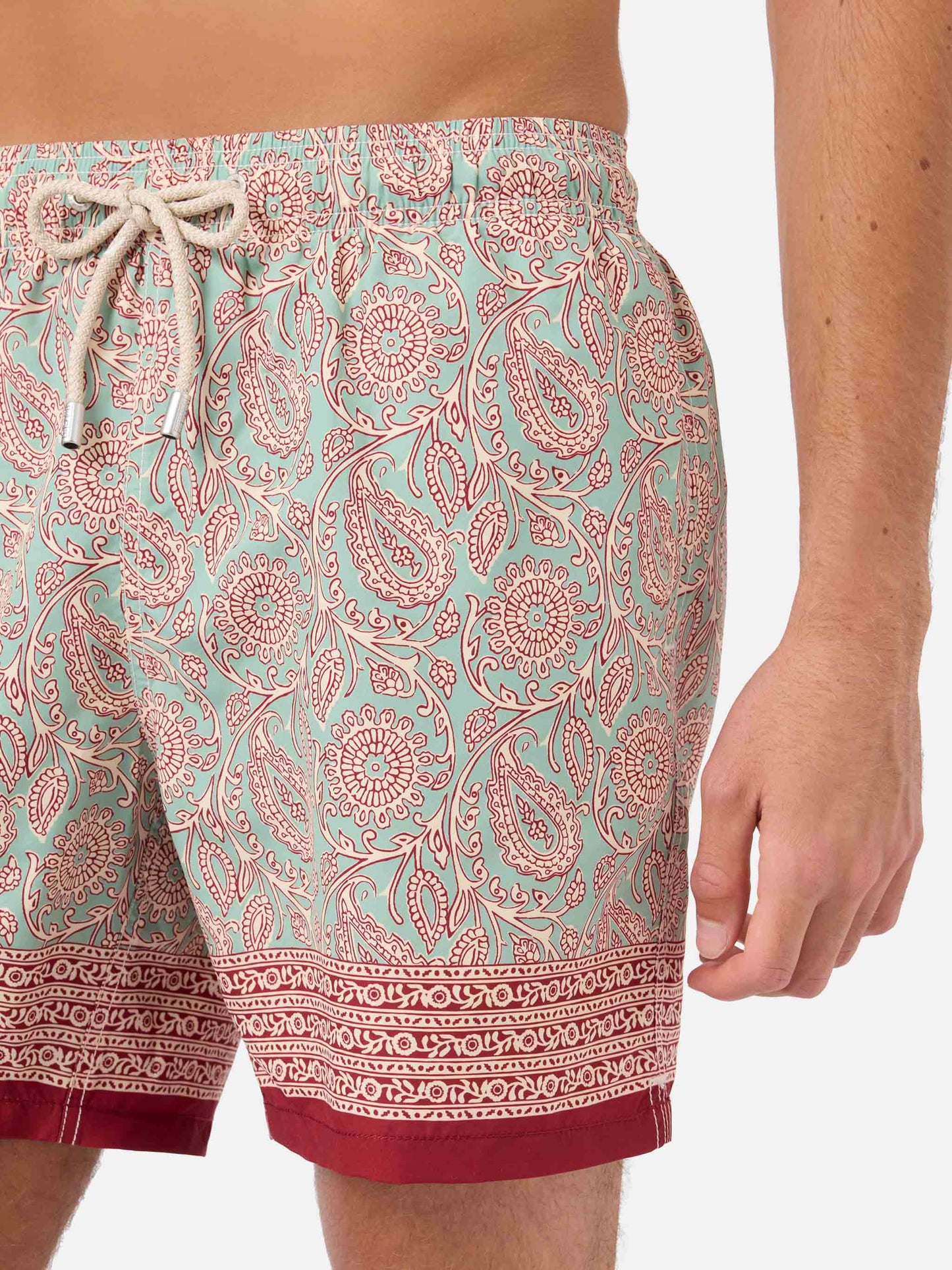 Gustavia aqua green swim shorts with contrasting paisley print
