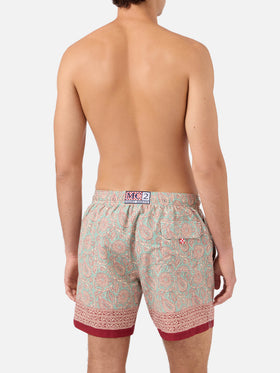 Gustavia aqua green swim shorts with contrasting paisley print