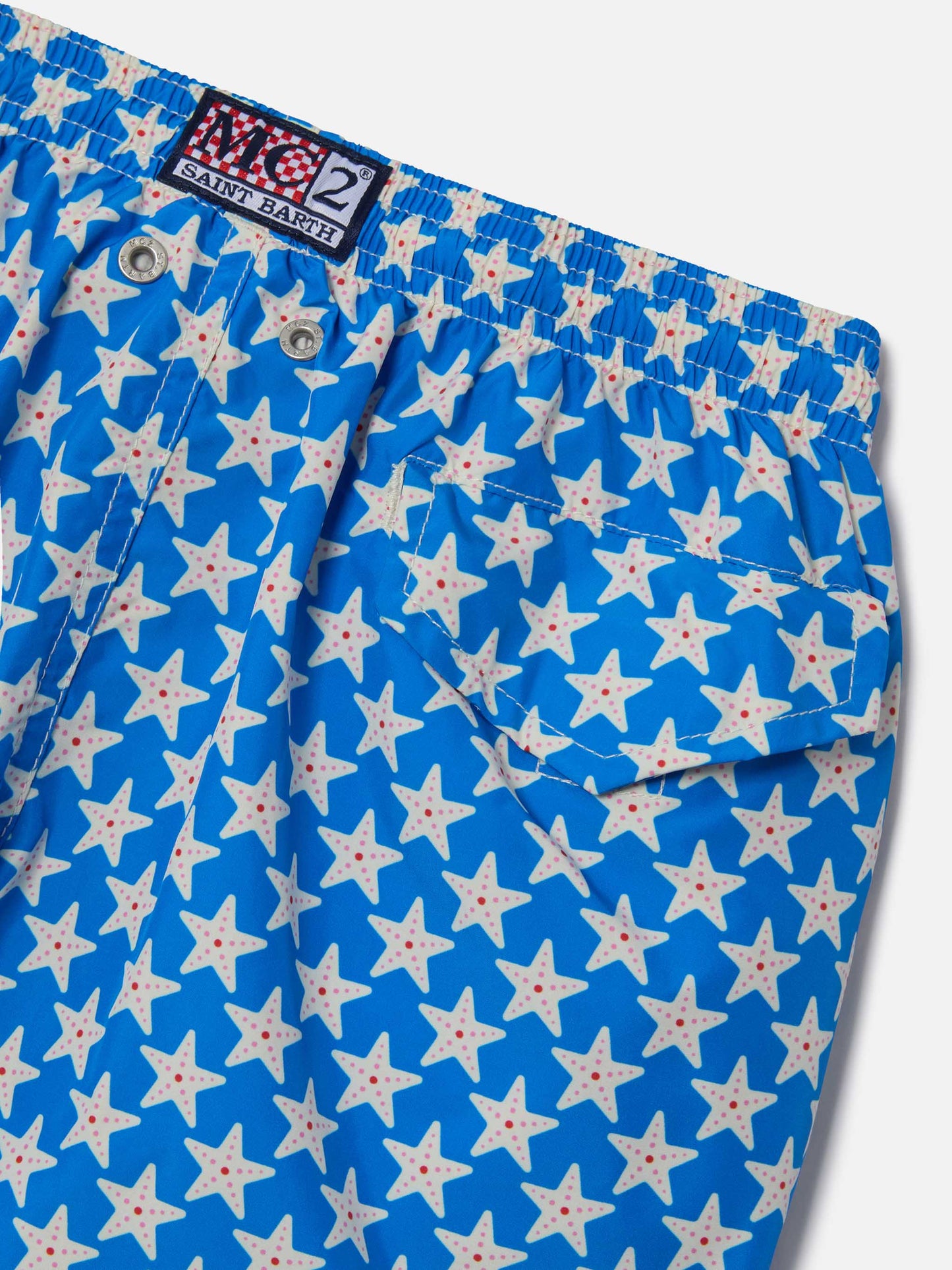 Boy lightweight fabric swim-shorts Jean Lighting 70 with seastars print