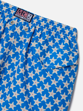 Boy lightweight fabric swim-shorts Jean Lighting 70 with seastars print