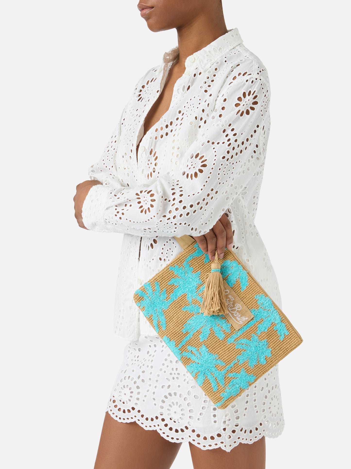 Jute pouch with embroidered palm pattern