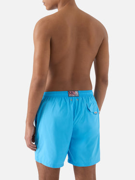 Lighting Pantone swim shorts in solid sky blue | Special Edition