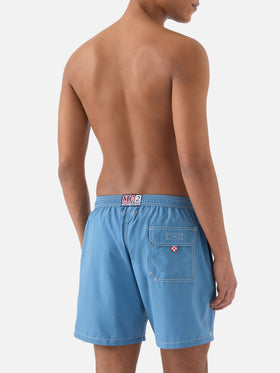 Patmos swim shorts in solid dusty blue