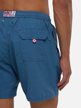 Patmos swim shorts in navy blue with used effect and logo embroidery