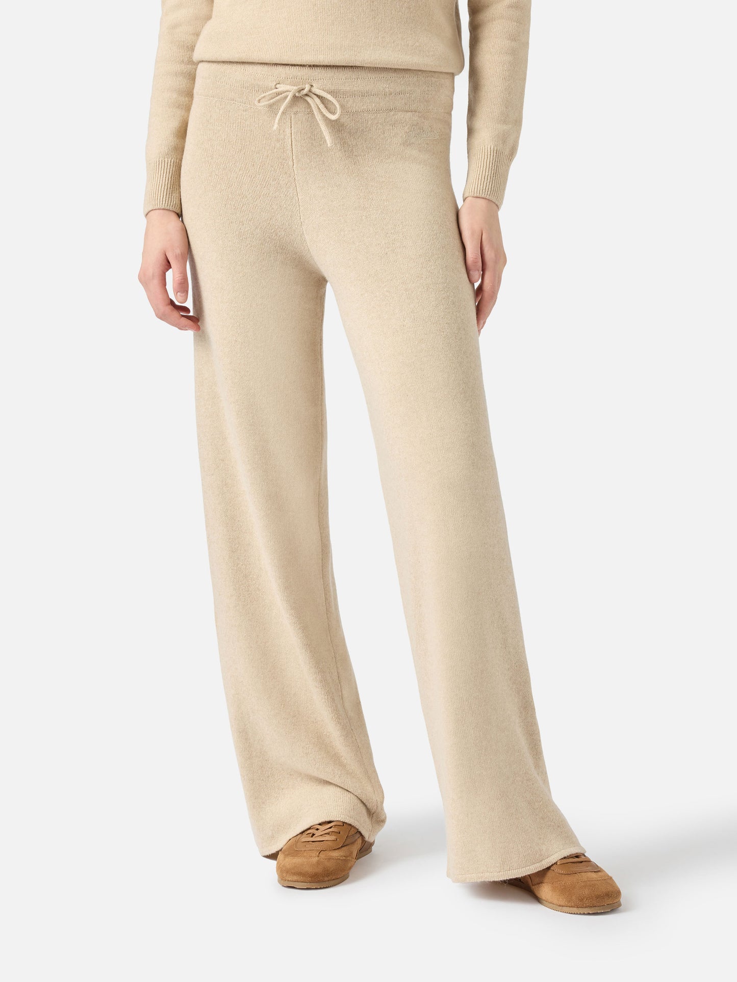 Pantalone a palazzo beige in maglia