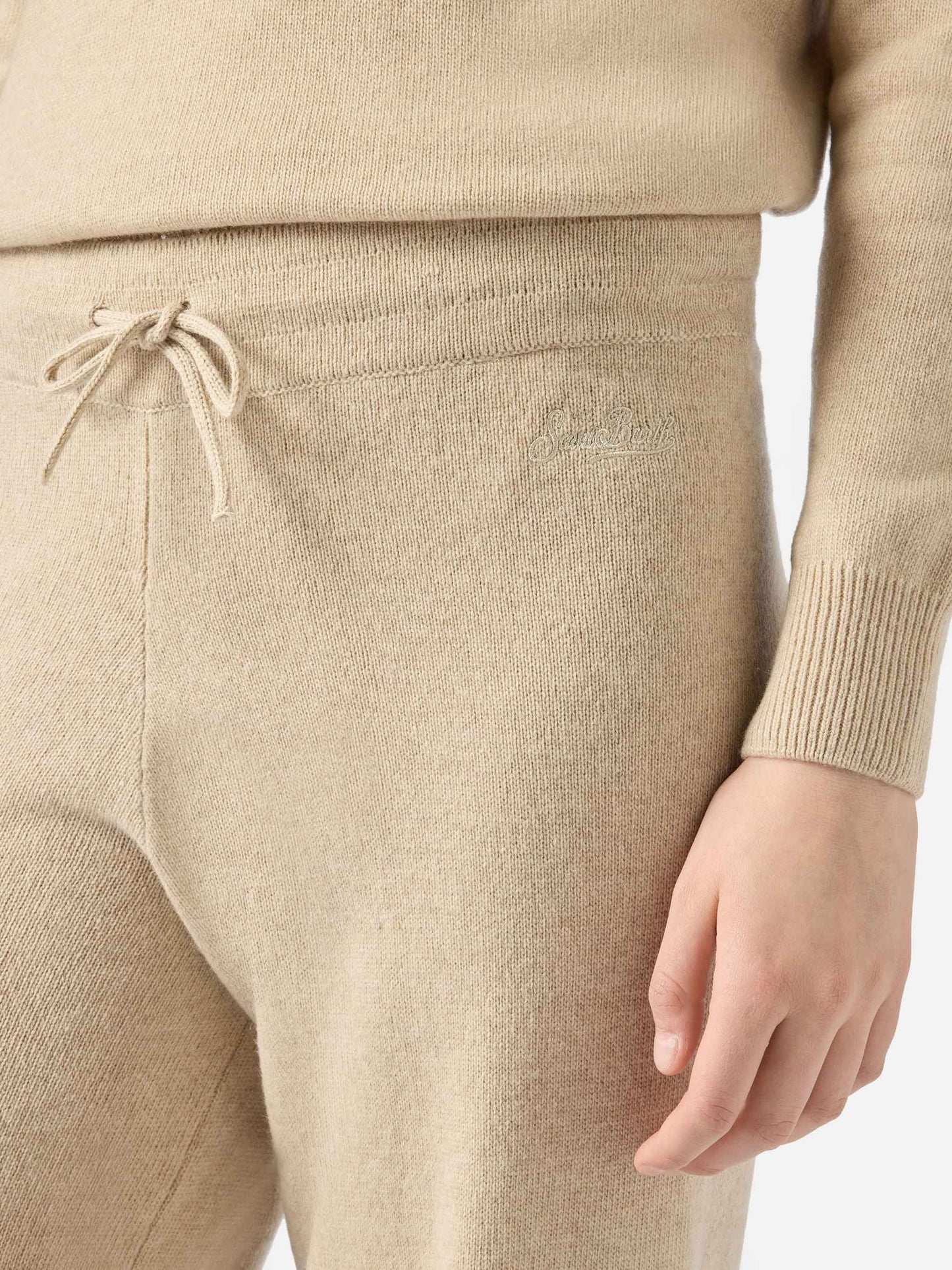 Pantalone a palazzo beige in maglia