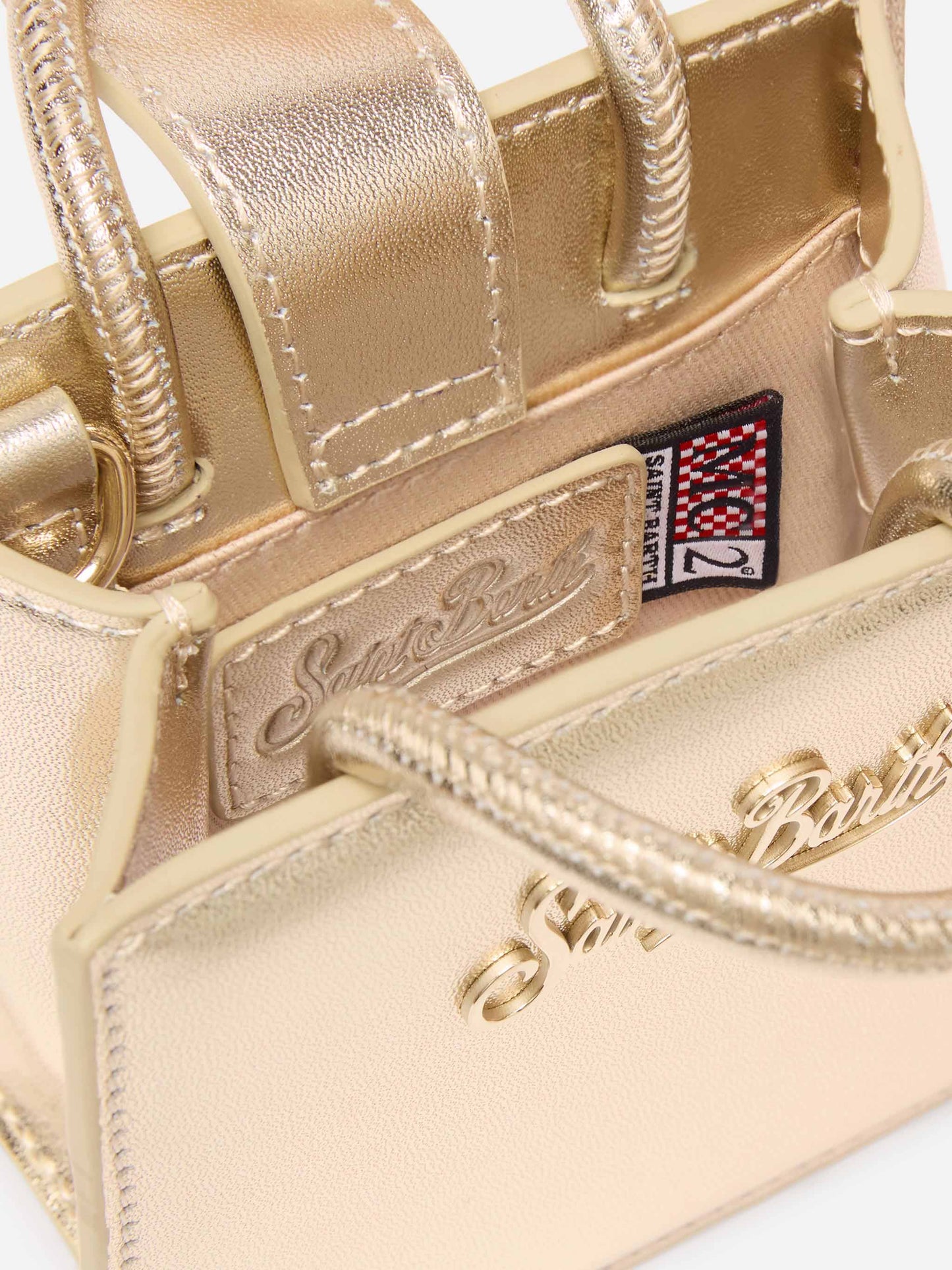 Shop Bag Micro in gold laminated leather