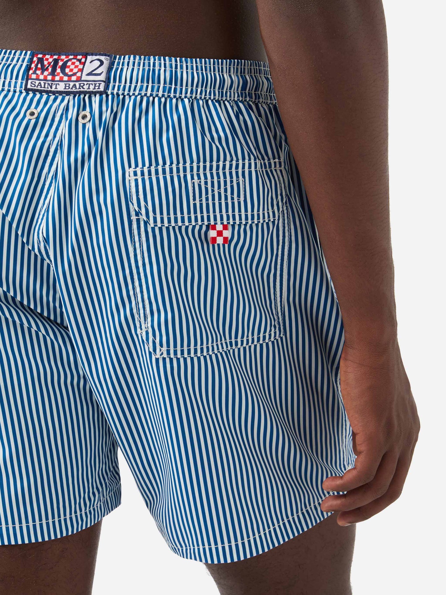 Syros swim shorts with white and blue striped pattern