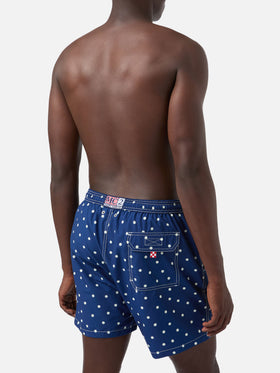 Syros swim shorts in blue with polka dot embroidery