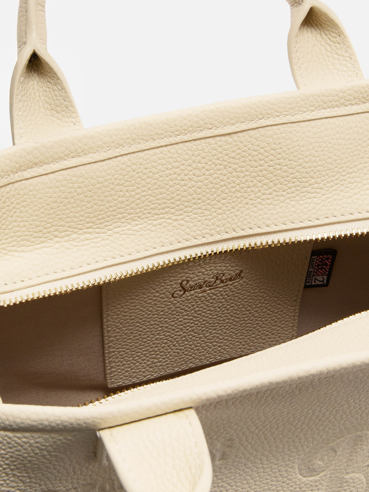Bolso Vanity mediano de piel granulada color marfil 